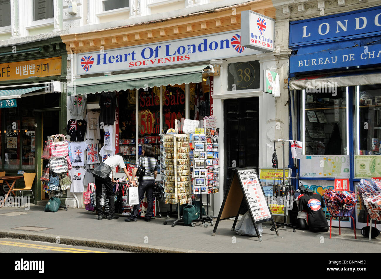 People outside the Heart of London Souvenirs shop in Museum Street Bloomsbury Camden England UK Stock Photo