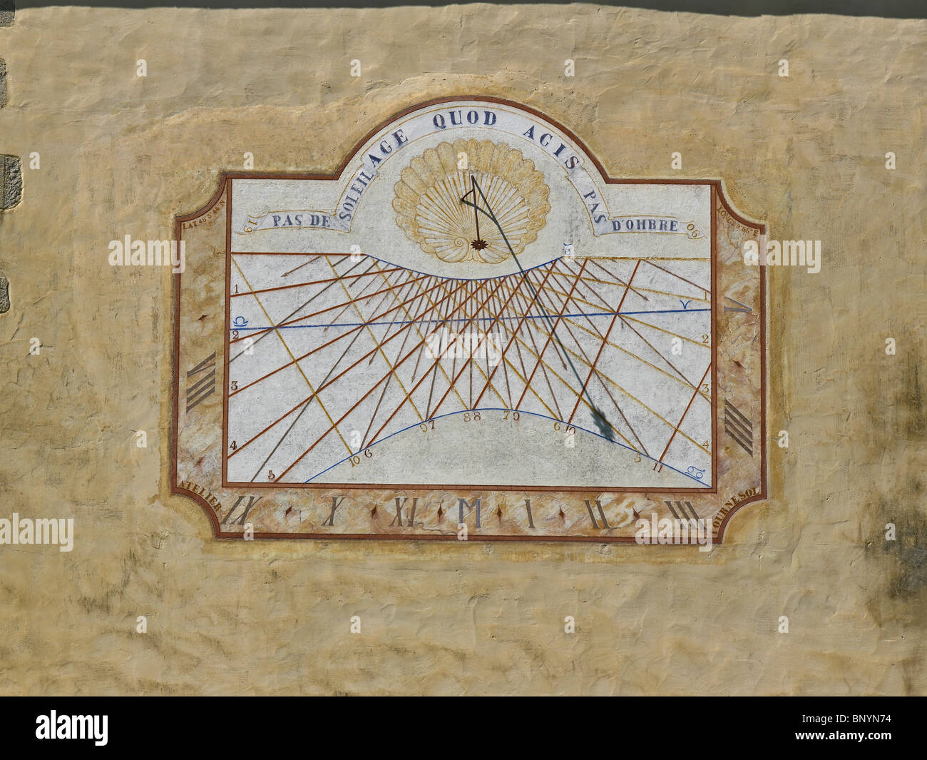 Detail of the sundial on the Chateau wall at Chameroles Stock Photo