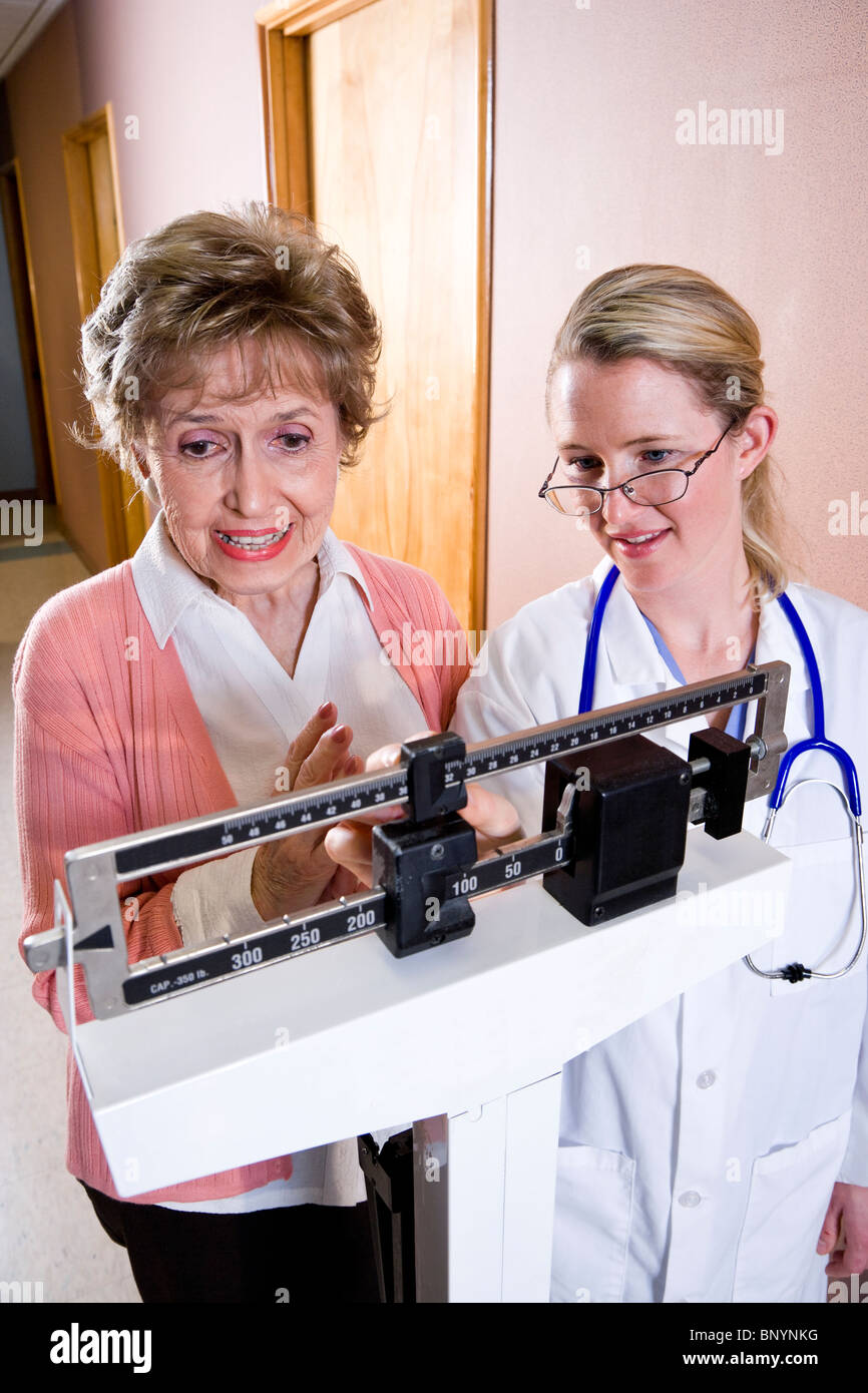 Doctor Weighing Woman On Balance Weight Scale Stock Image, 55 OFF