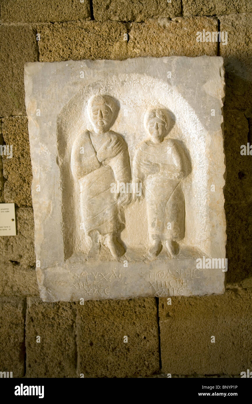 Grave stele male and female figures from Nisyros, Archaeological museum, Rhodes, Greece Stock Photo