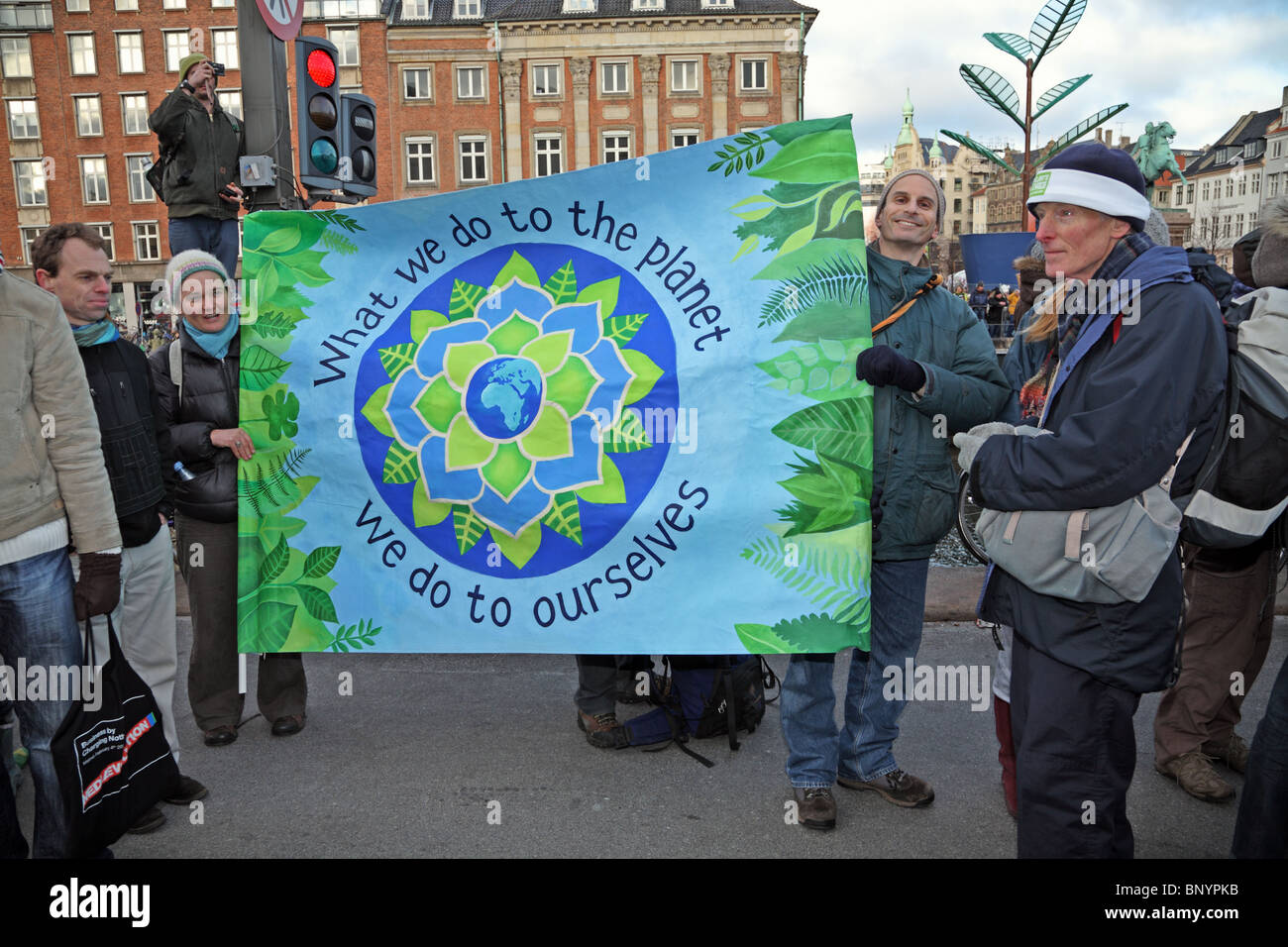 Demonstrators with banner in front of the Parliament building in Copenhagen at the UN Climate Change Conference. Climate march. Stock Photo