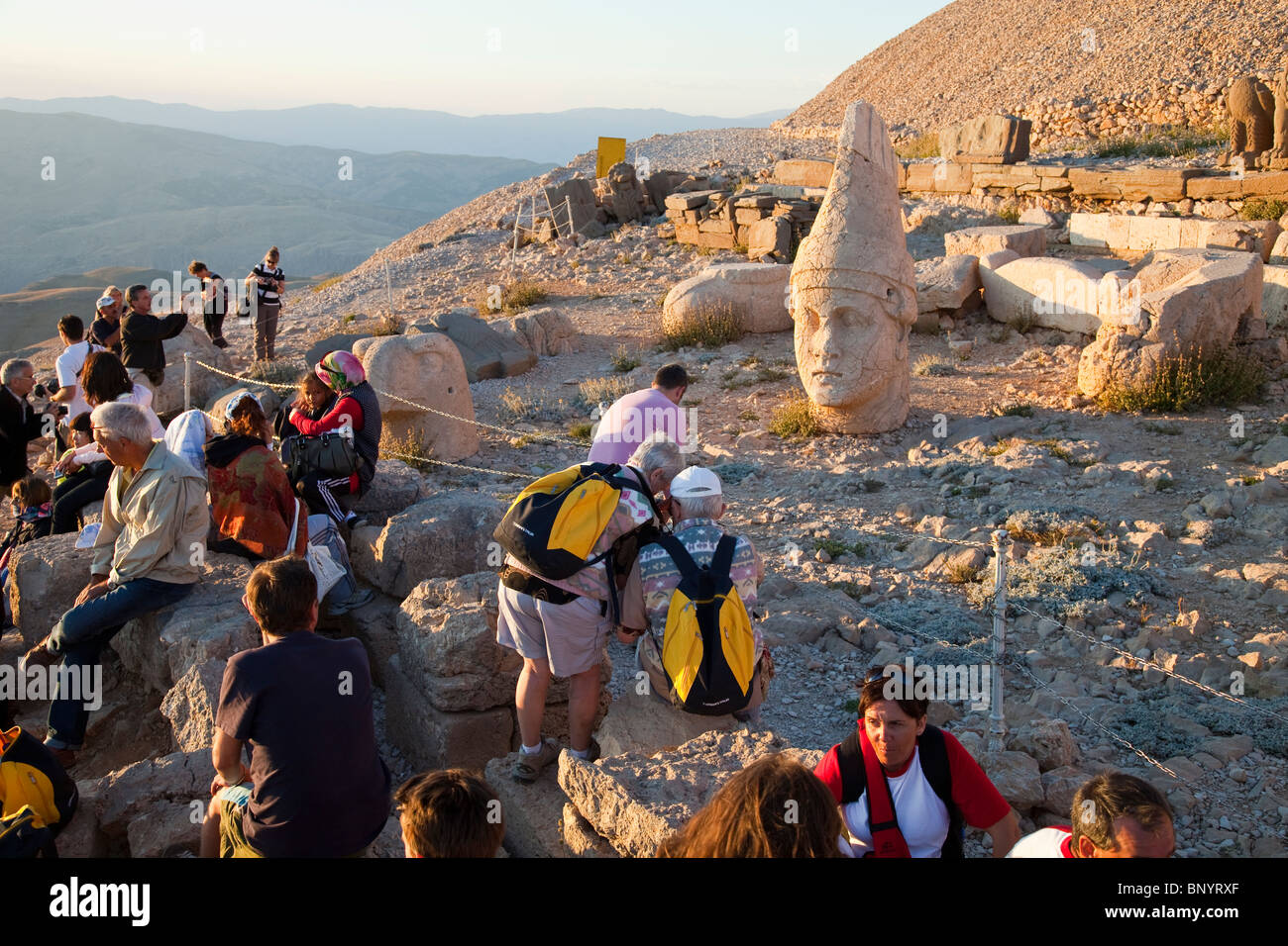 Tourists waiting for sunset at Mount Nimrut in Turkey Stock Photo