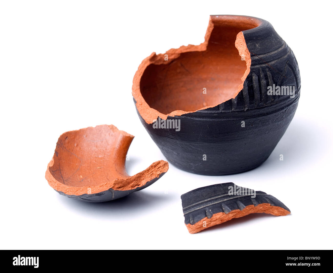 Broken antique clay pot on a white background Stock Photo Alamy