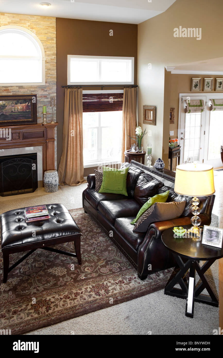 Brown leather sofa on outlet wooden floor