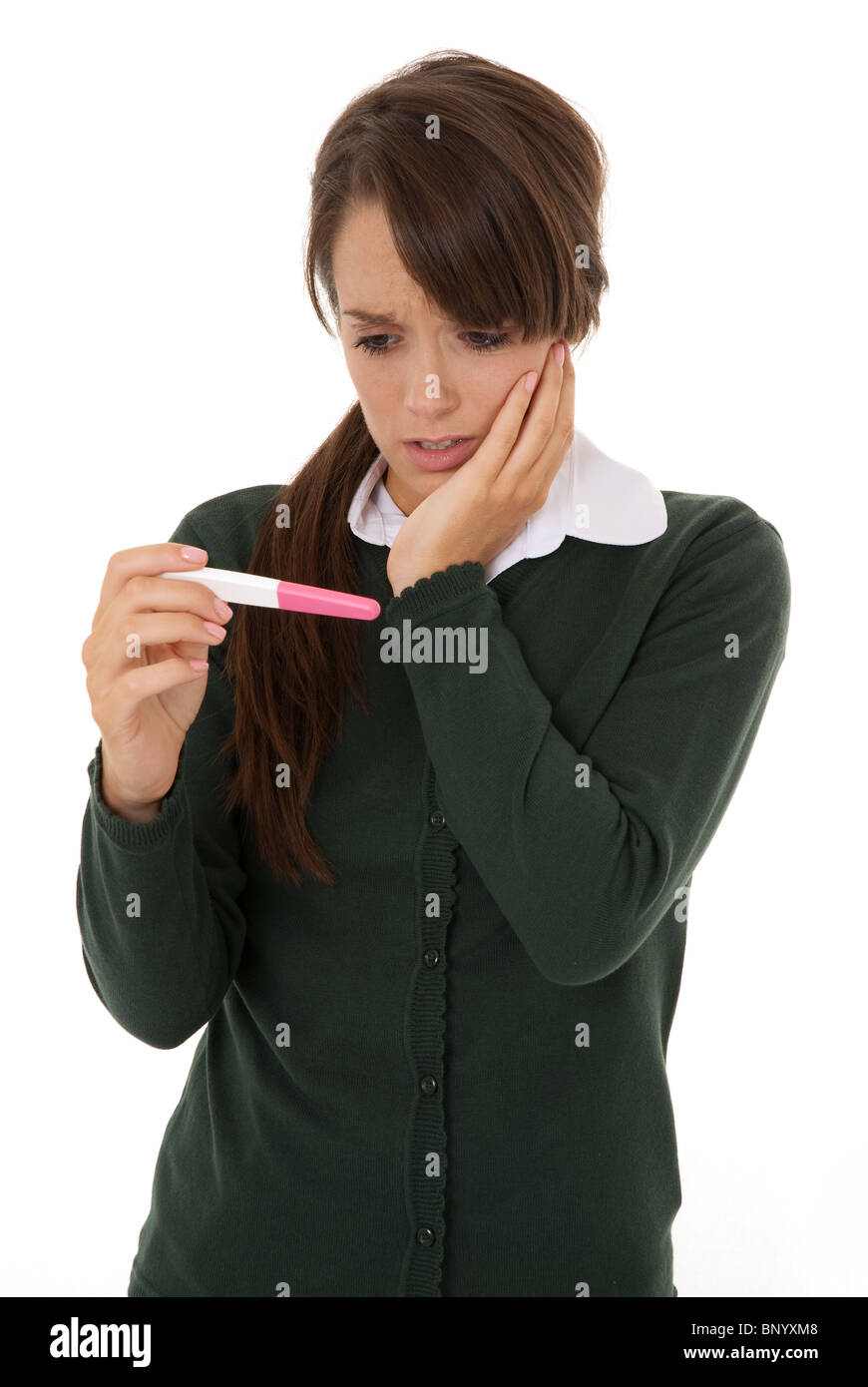 Shocked pregnancy result for a young school girl Stock Photo