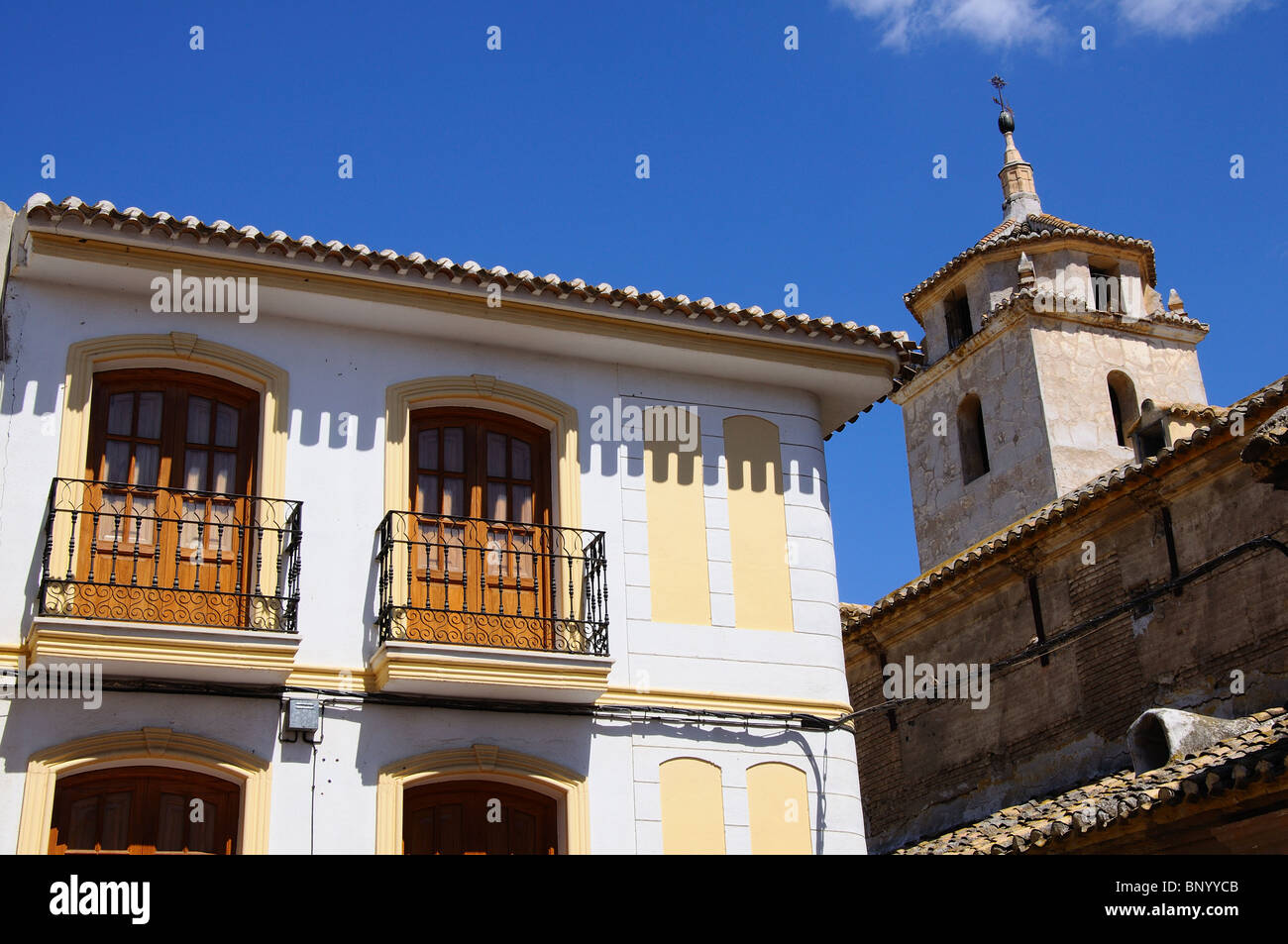 Townhouse with Santa Maria church to the right, Albox, Almeria Province, Andalucia, Spain, Western Europe. Stock Photo