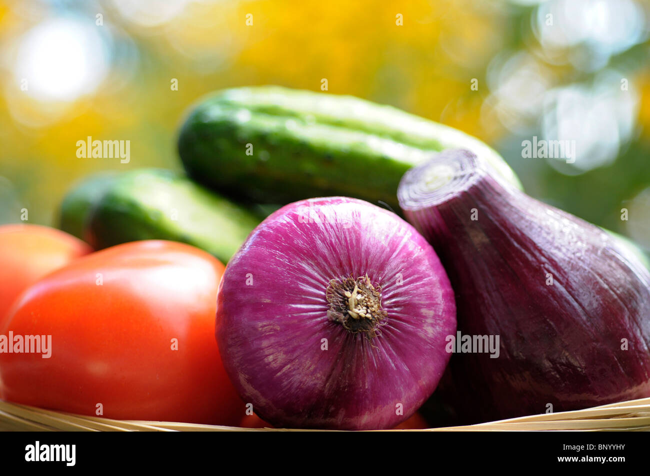 Vegetables, Raw - Red Onion, Cucumbers, Tomatoes Stock Photo
