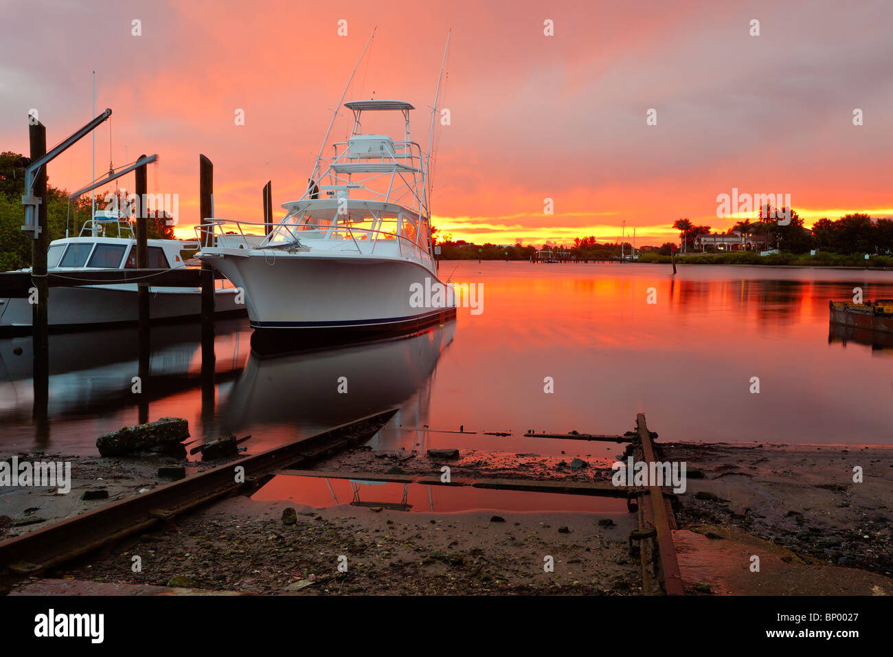 Private and commercial fishing boat at sunset at Tarpon Springs, Florida Stock Photo