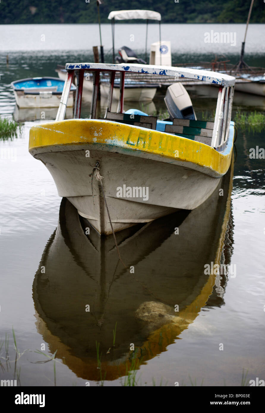 Boats moored at San Lucas Toliman on the shore of Lake Atitlan in Guatemala Stock Photo