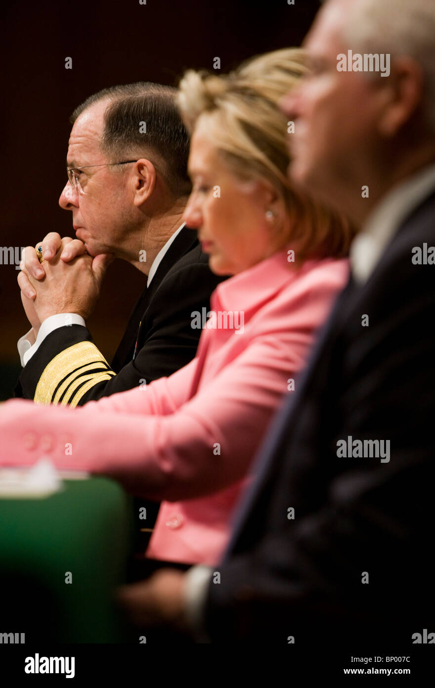 Chairman, Joint Chiefs of Staff Admiral Michael Mullen, Secretary of State Hillary Clinton, Defense Secretary Robert Gates. Stock Photo