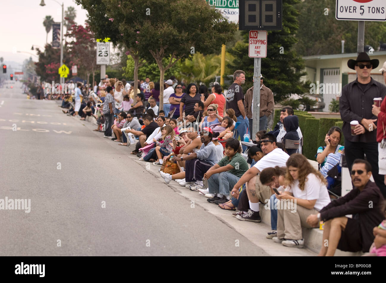Spectators line the streets at the La Habra Corn Festival parade Stock
