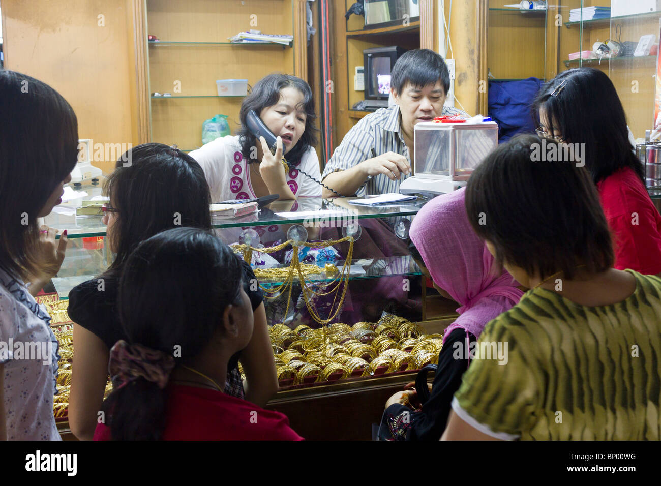 customers at gold stall, Bogyoke Aung San Market, formerly Scott's Market, Yangon, Mmanmar Stock Photo