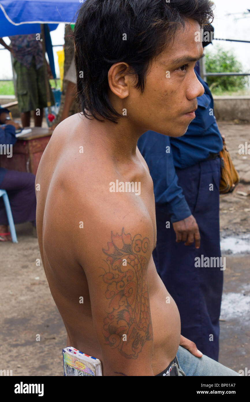 manual labourer with tattoo, Yangon docks, Myanmar Stock Photo