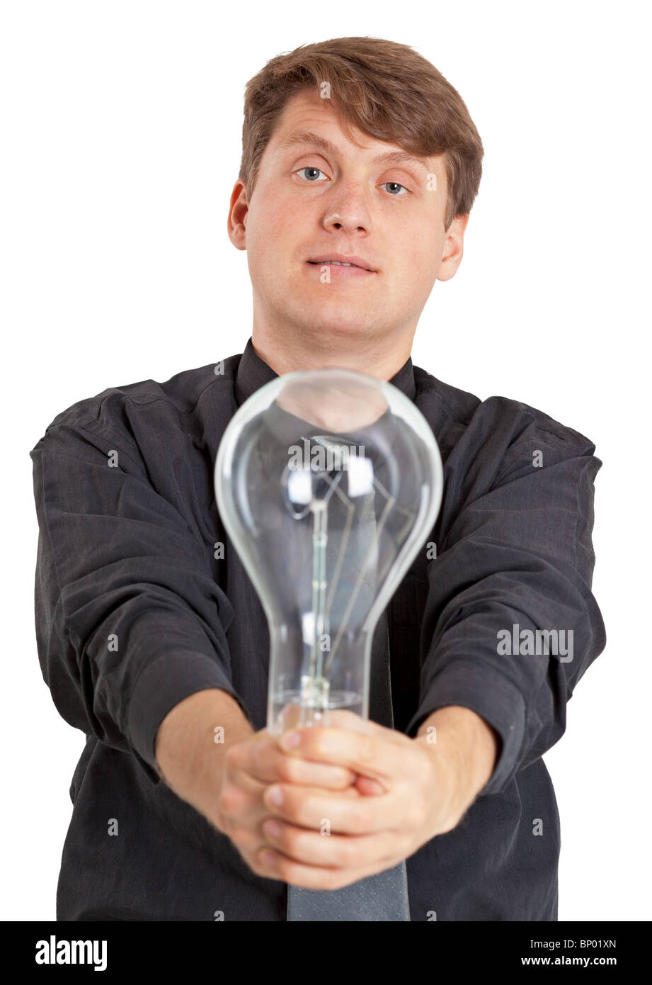 The young man with a huge electric bulb in hands Stock Photo Alamy