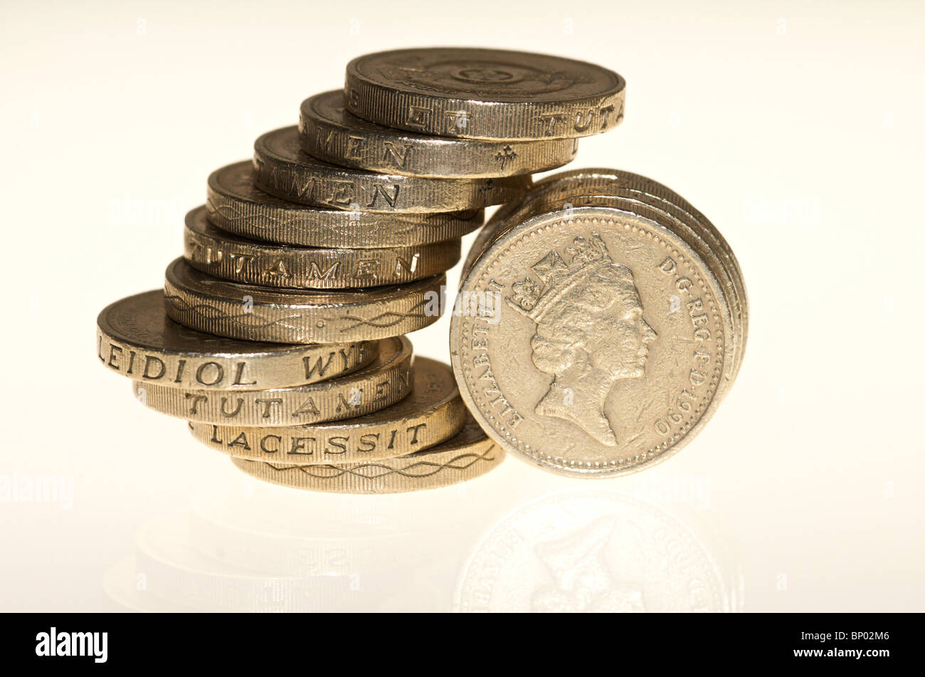 A pile or stack of one pound coins Stock Photo