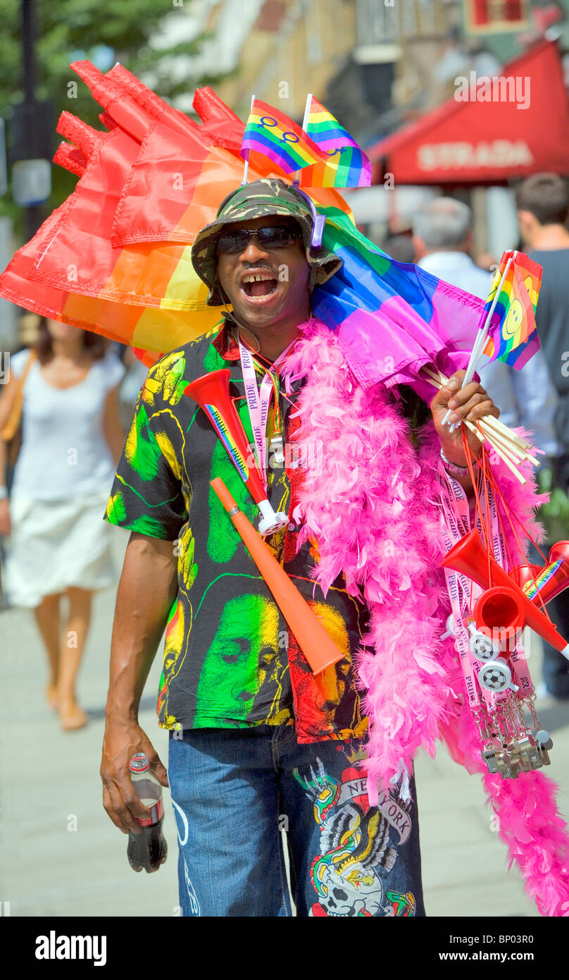 Merchandise salesman at Gay Pride March, London, England, UK, Europe Stock Photo