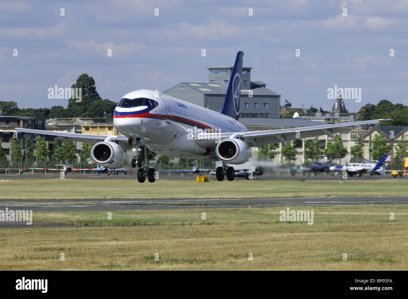 Sukhoi Superjet 100 landing at the Farnborough Airshow Stock Photo