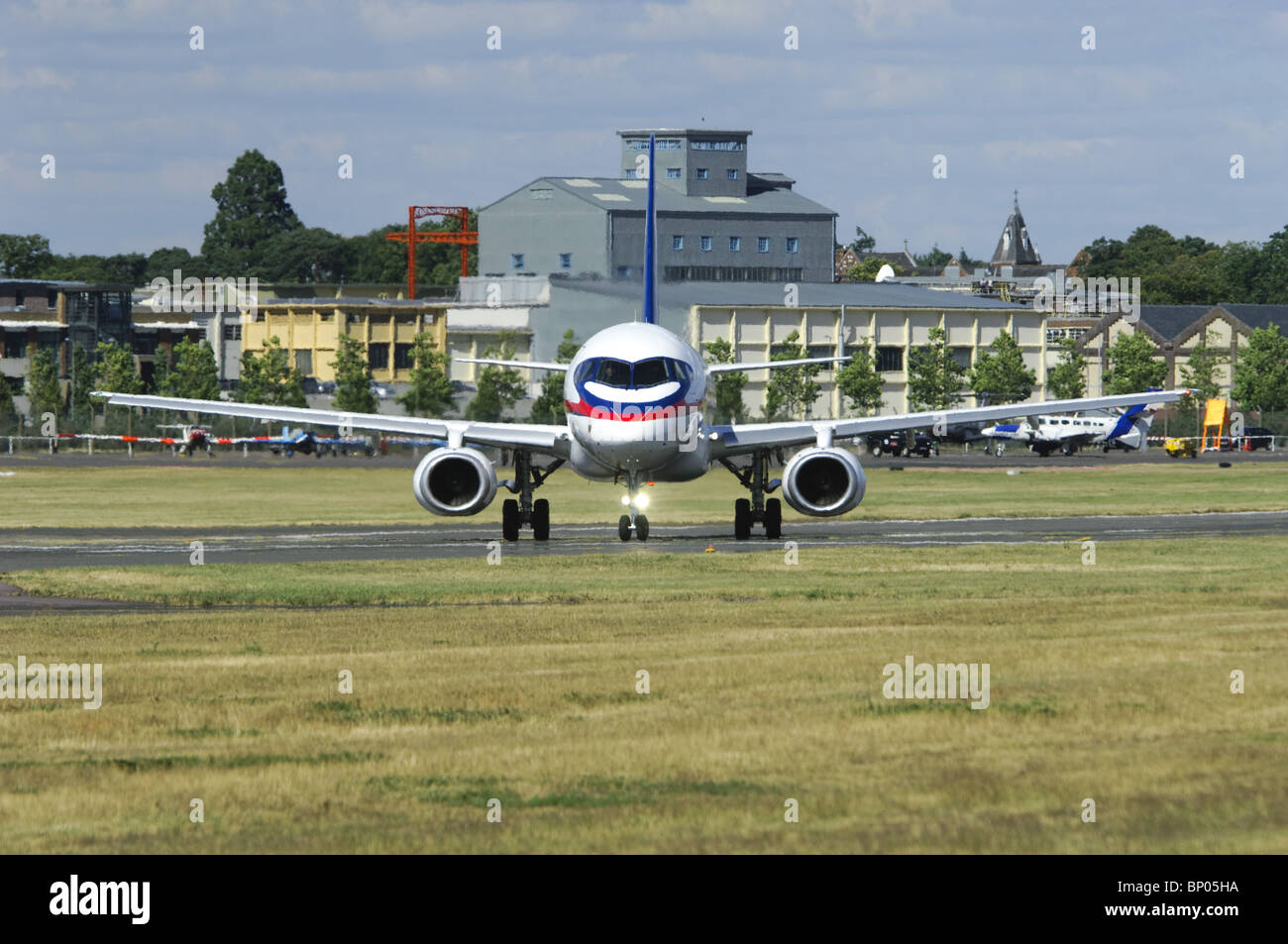 Sukhoi Superjet 100 taxiing out onto the runway at the Farnborough Airshow Stock Photo