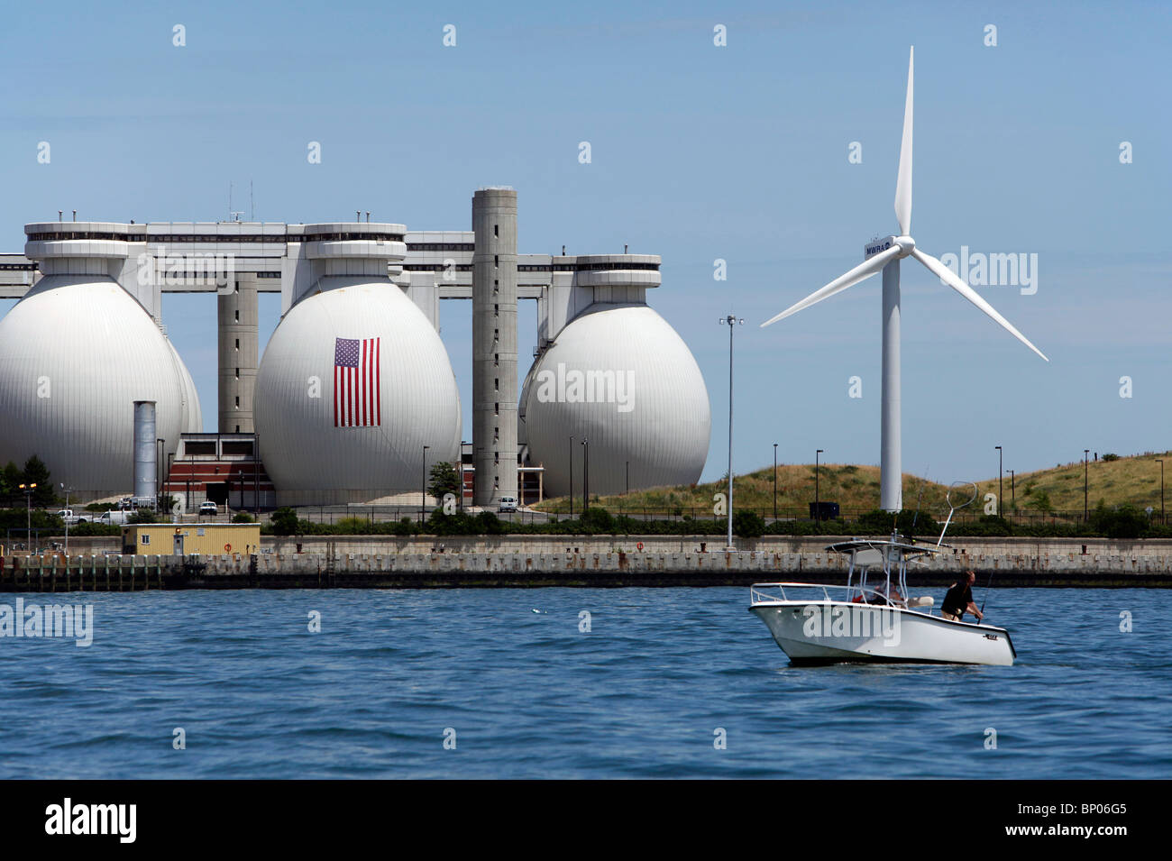 The sewage treatment plant and a wind powered turbine at Deer Island on Boston Harbor, Massachusetts Stock Photo