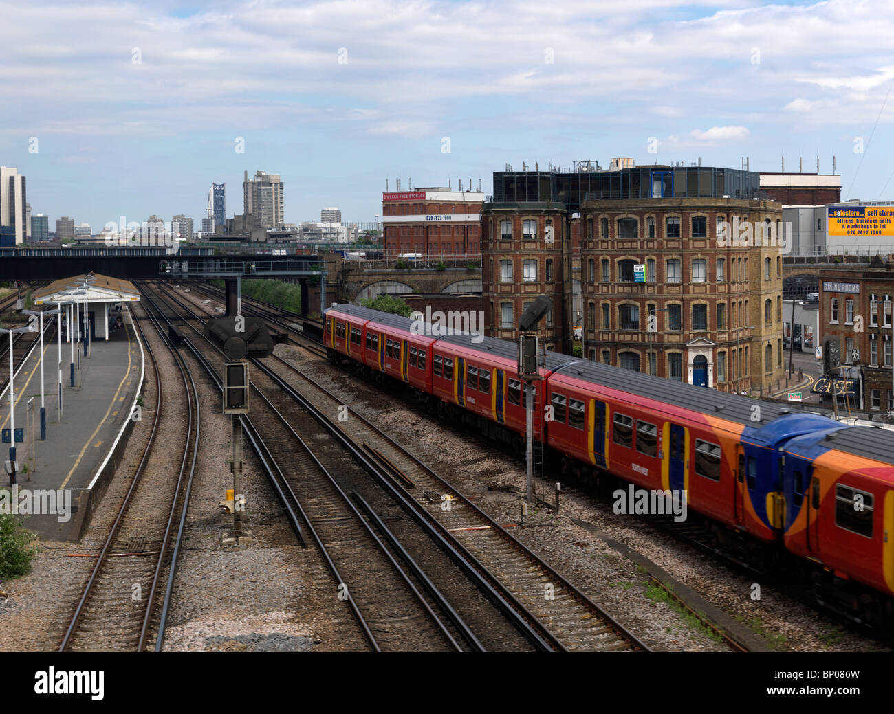 Train approaching Clapham Junction station Stock Photo Alamy