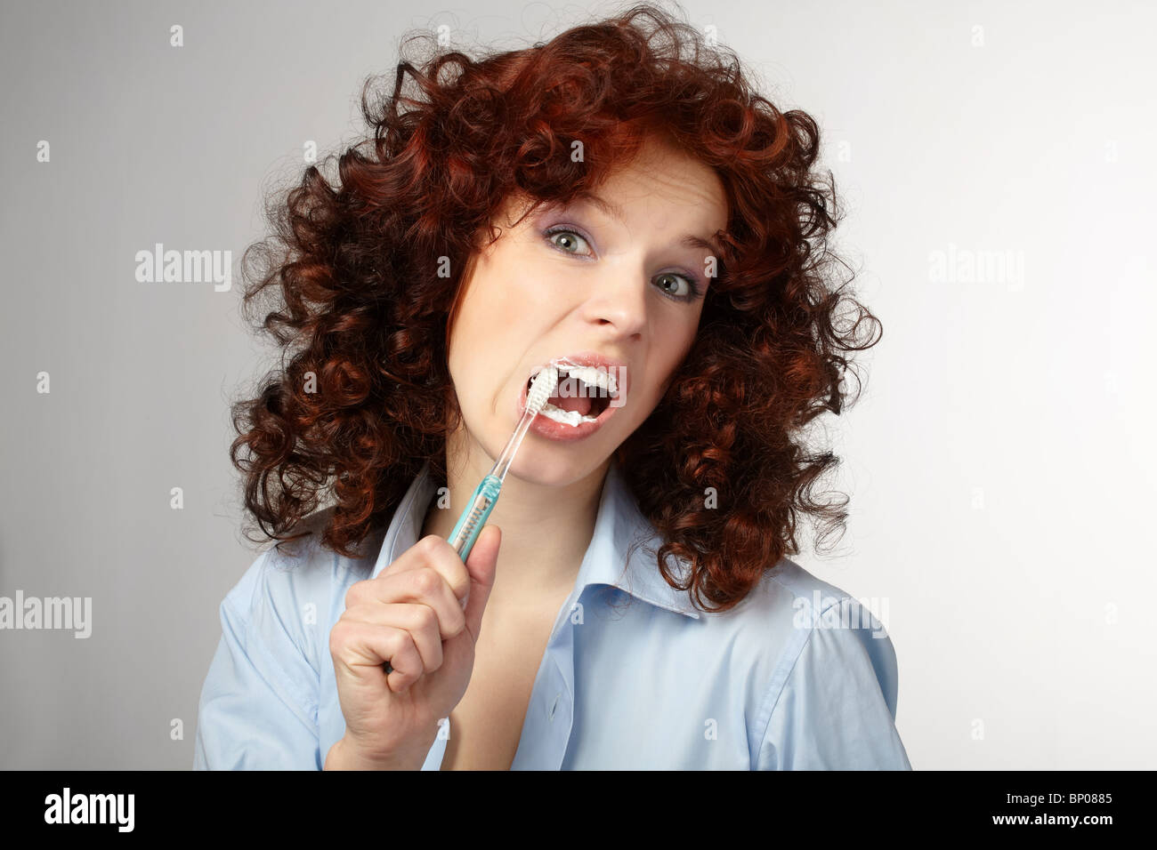 Young beauty woman clean teeth Stock Photo - Alamy