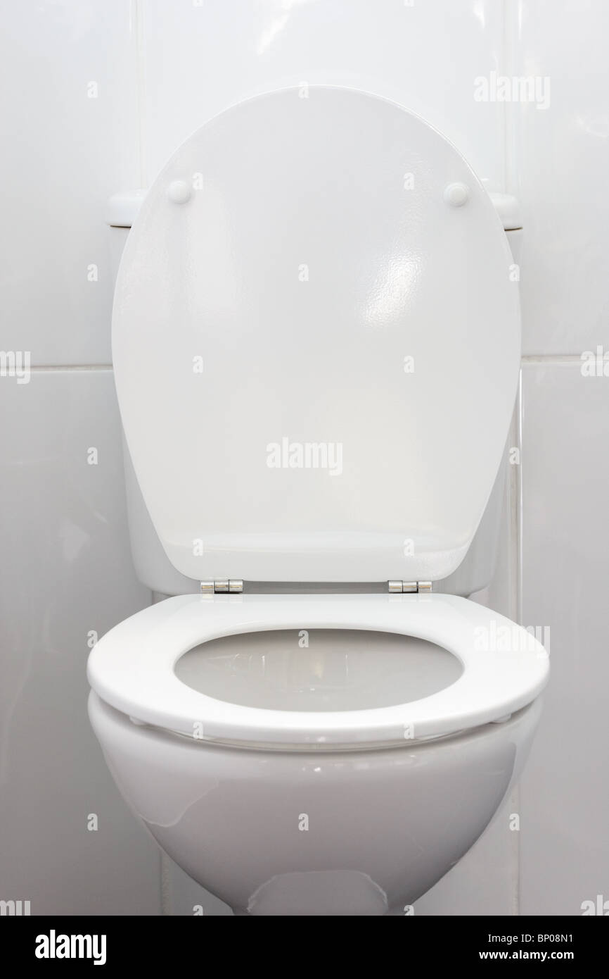 toilet bowl with lid up and seat down Stock Photo