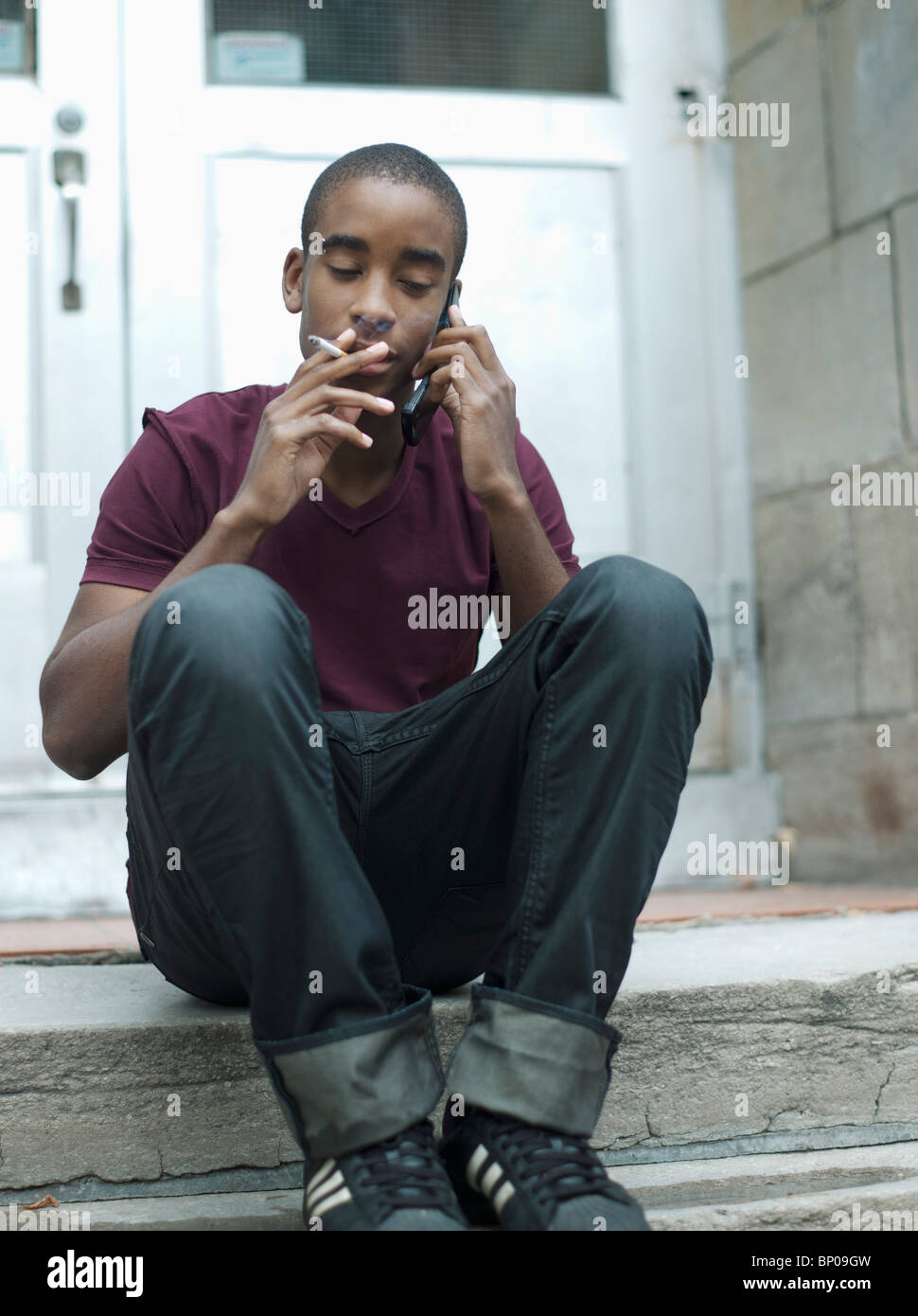 Teenage Boy Smoking While Phoning Stock Photo Alamy teenage-boy-smoking-while-phoning-stock-photo-alamy