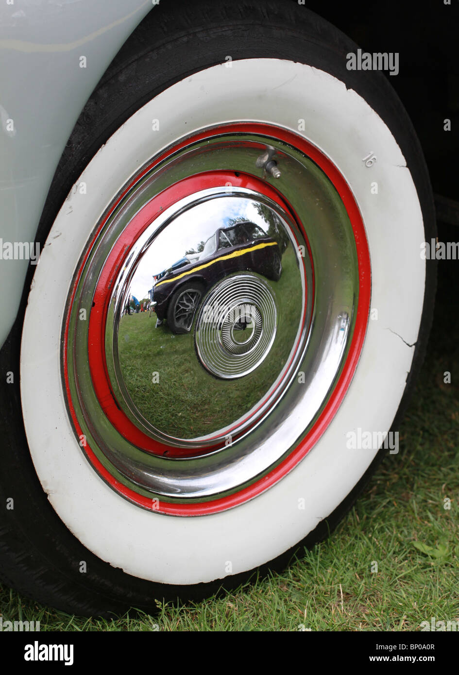 Hillman Imp reflected in wheel trim of 1951 Humber Super Snipe Mark 3 at a classic car show Stock Photo