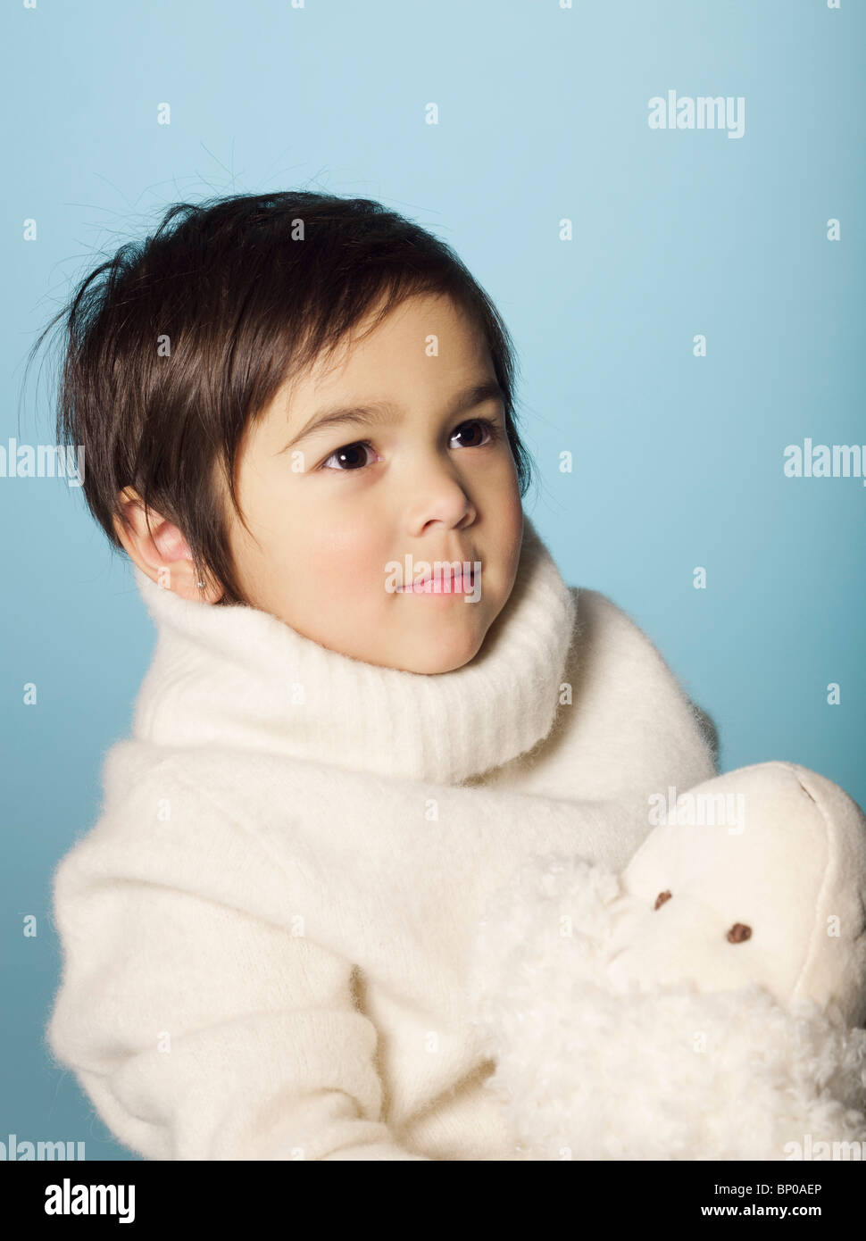 Portrait of little girl with stuffed toy Stock Photo - Alamy