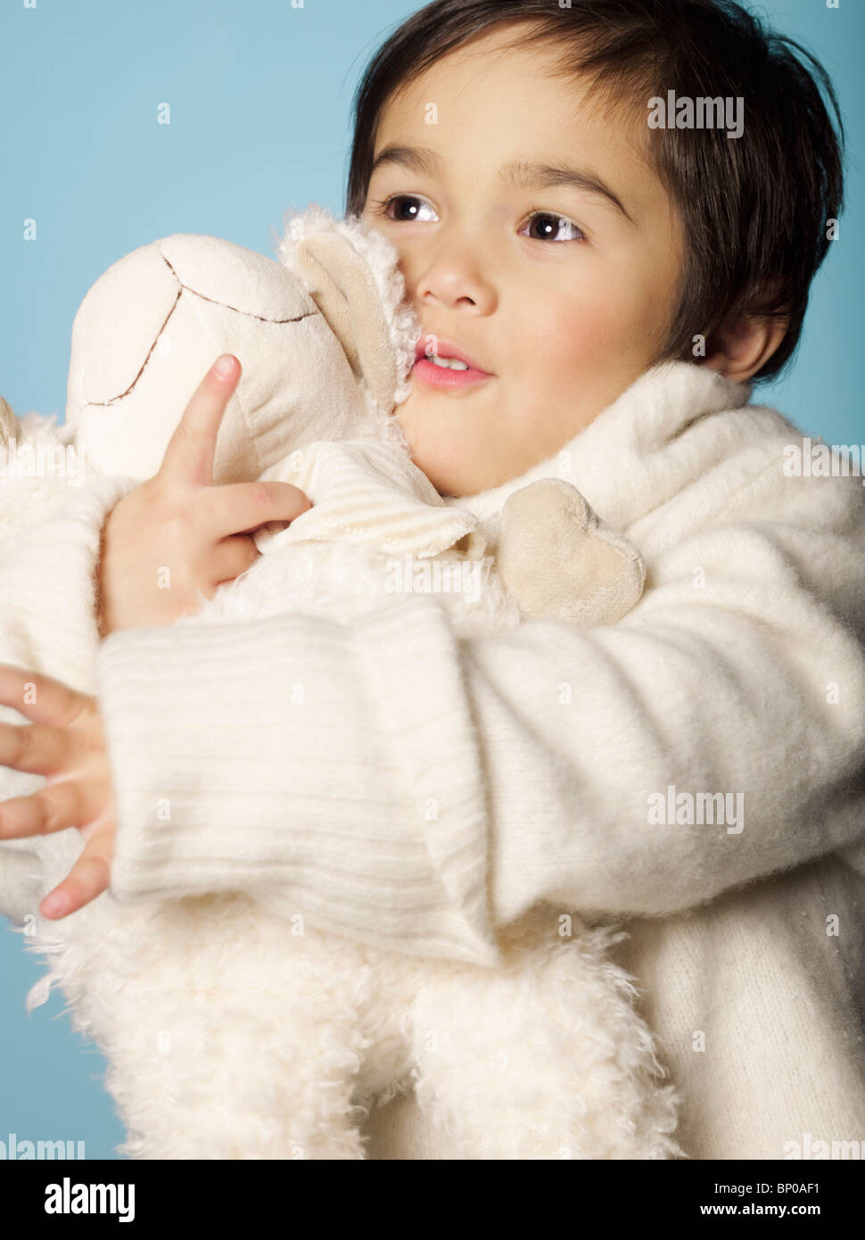 Portrait of little girl with stuffed toy Stock Photo - Alamy