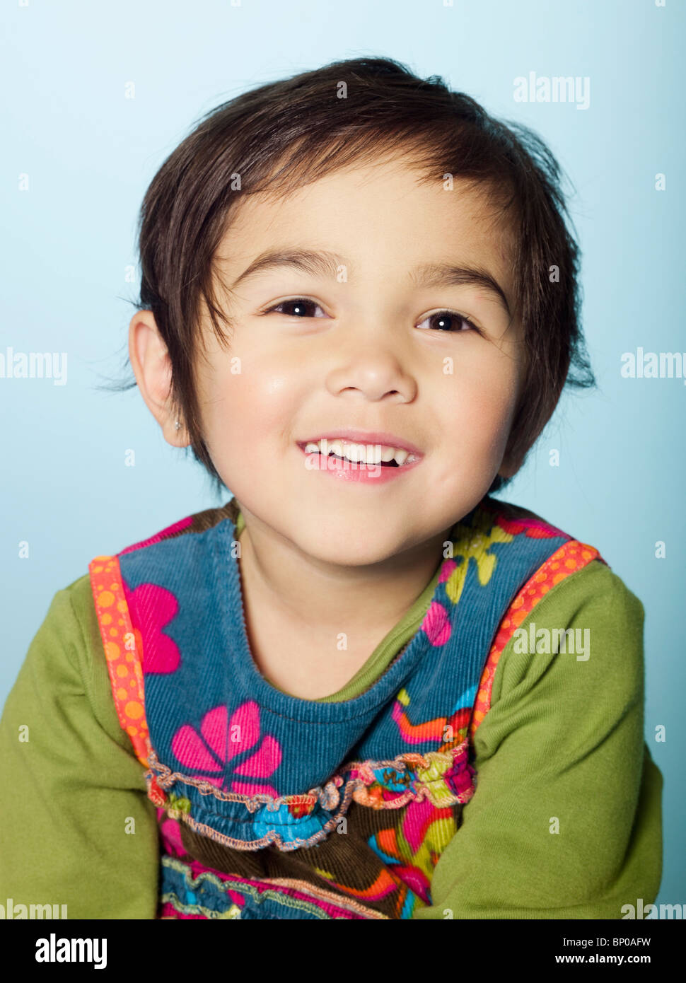 Portrait of little girl smiling for camera Stock Photo - Alamy