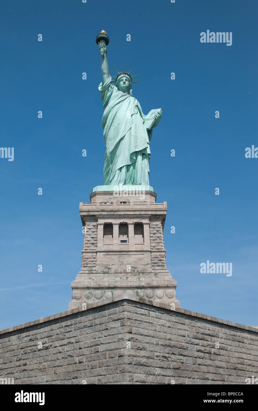 The Statue of Liberty on Liberty Island in New York Harbor Stock Photo