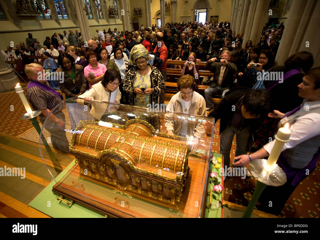Worshipers file past the relics of Saint Therese of Lisieux at St John ...