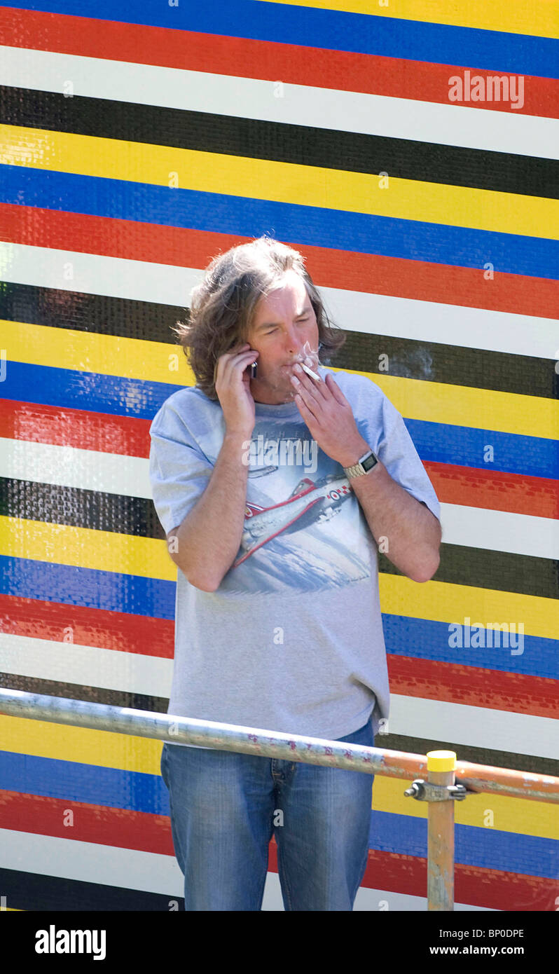 Television presenter James May builds a life size Lego house. Picture by James Boardman. Stock Photo