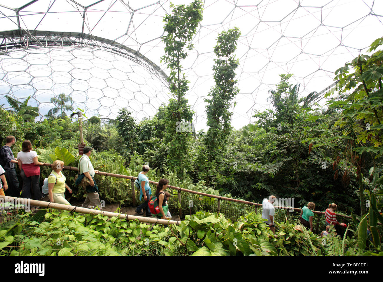 England, Cornwall, Eden Project. Visitors inside the Tropical Biome. Stock Photo