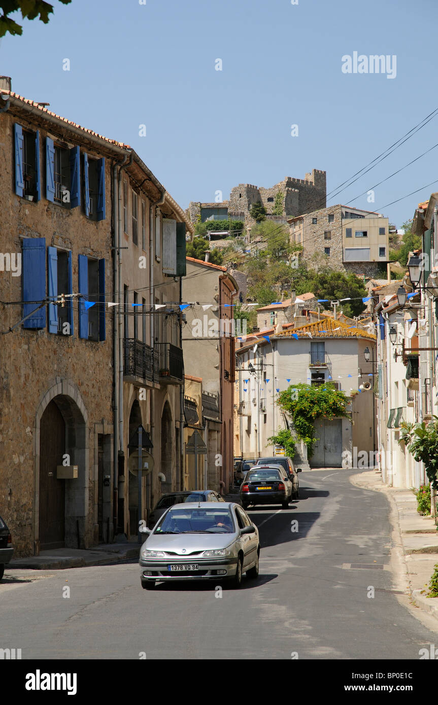 Fitou a wine producing town with chateau standing above the main street