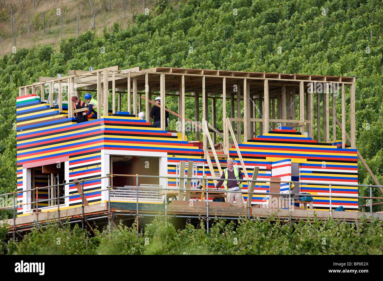 Television presenter James May builds a life size Lego house. Picture by  James Boardman Stock Photo - Alamy