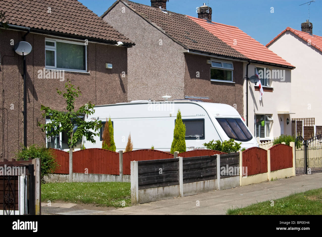 Caravan in front garden of house, Swinton, Salford, Greater Manchester, UK Stock Photo