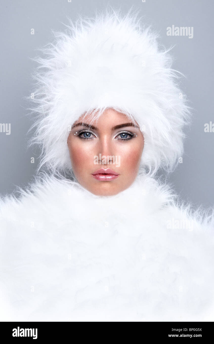 Woman wearing white fur Stock Photo
