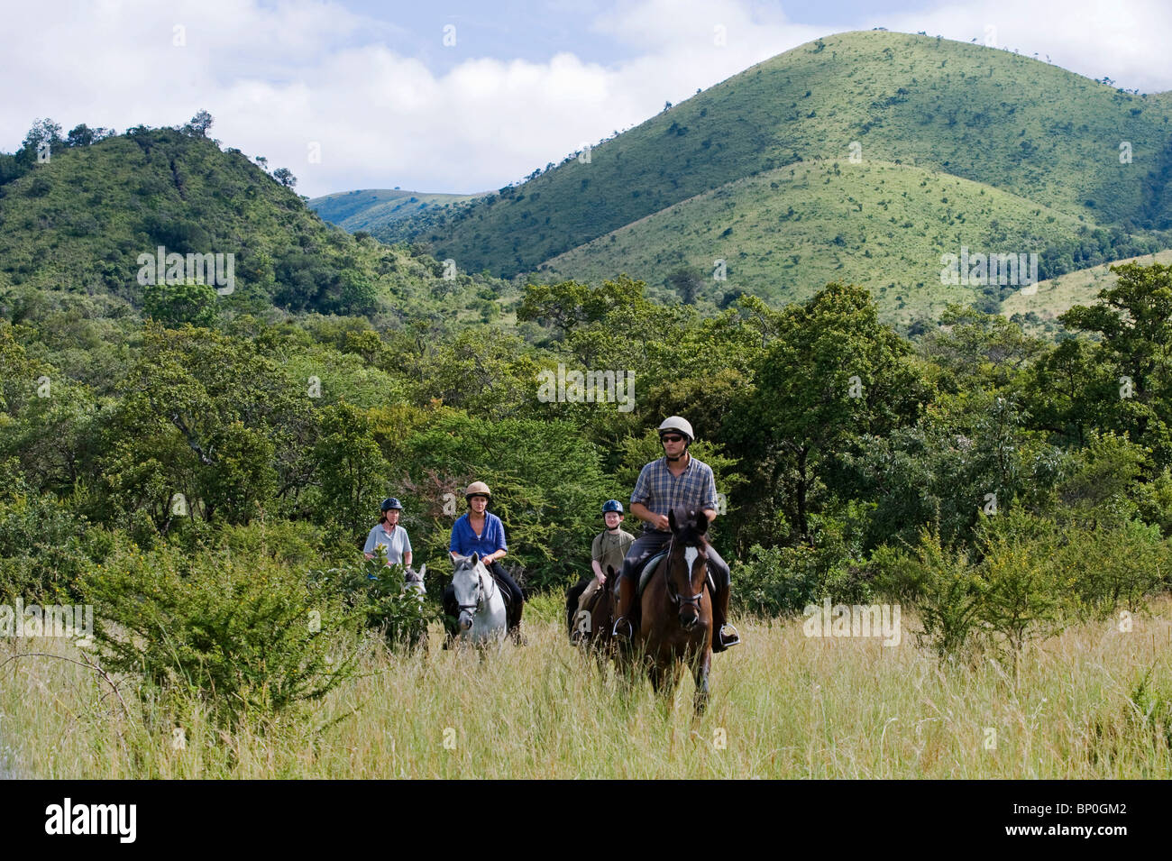Kenya, Chyulu Hills, Ol Donyo Wuas. A family on a riding safari with