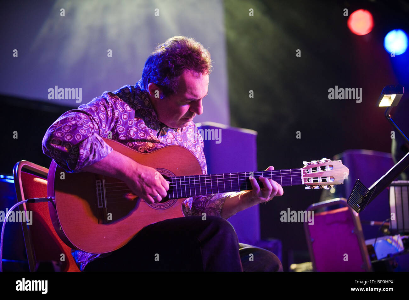 John Parricelli jazz guitarist playing acoustic guitar with the Andy Sheppard Band at Brecon Jazz Festival 2010 Stock Photo