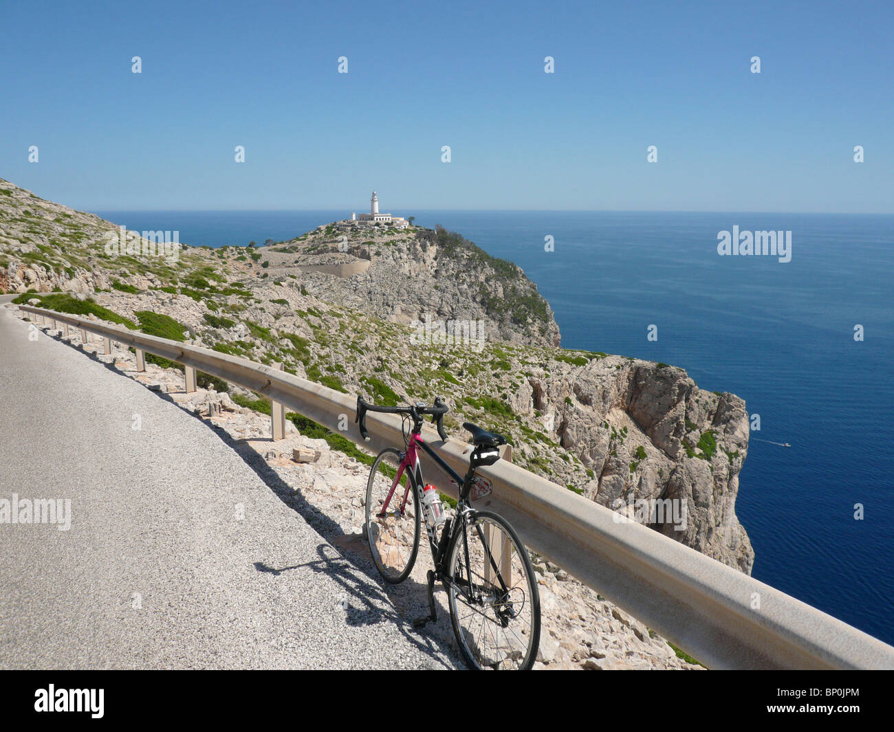 Cycling to the lighthouse at Cap Formentor Majorca Spain Stock Photo
