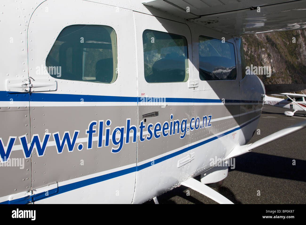 New Zealand, South Island, Milford Sound. Light aircraft parked on the apron on the remote Milford Sound airport. Stock Photo