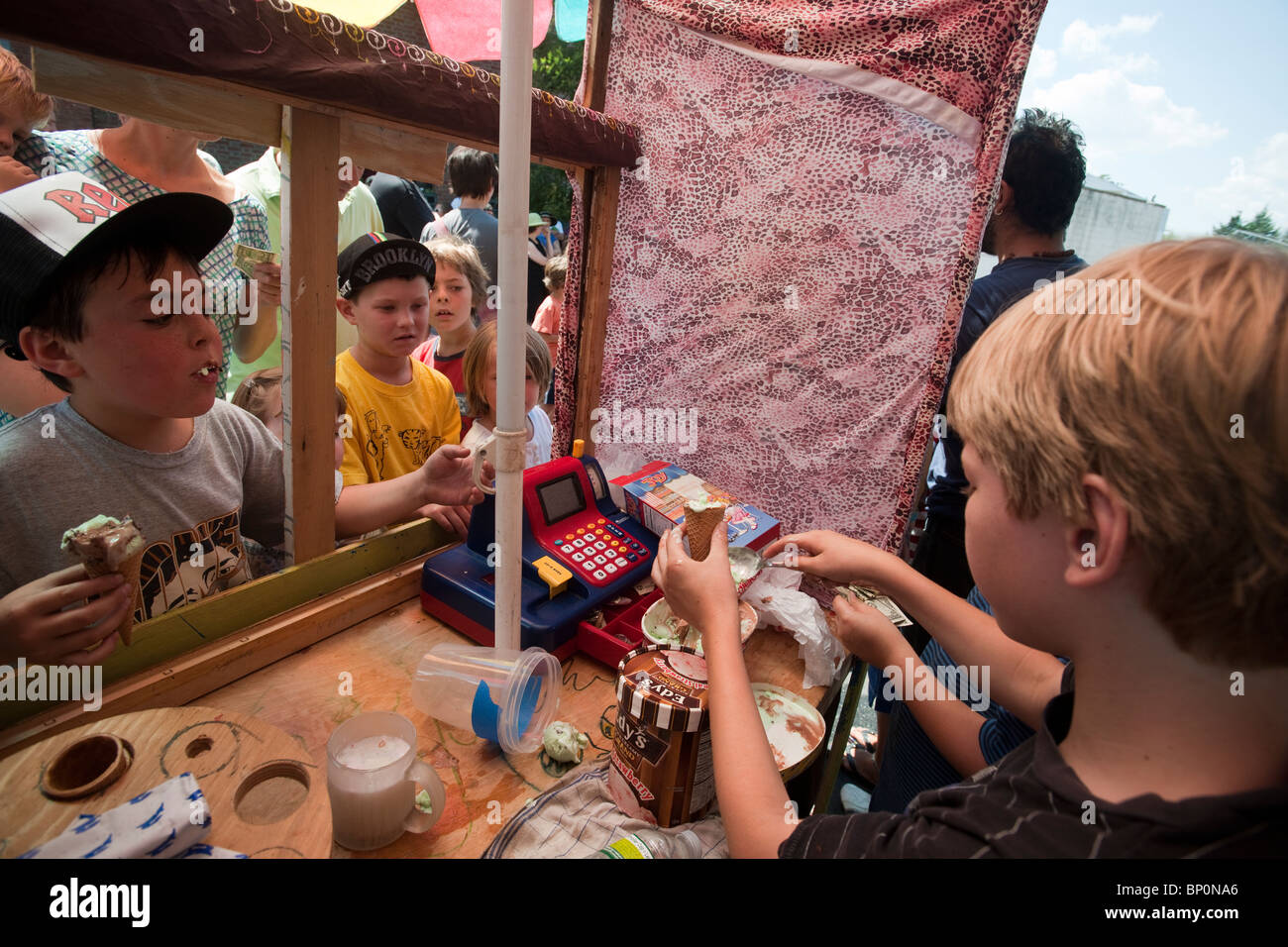 Kids run a popular ice cream stand during the dog days of August in Brooklyn in New York Stock Photo