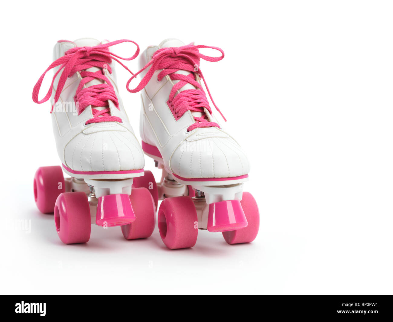 White with pink classic roller girl derby skates isolated on white background Stock Photo