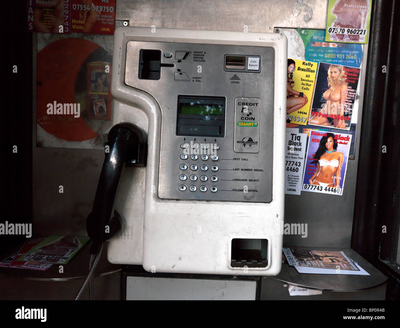 Telephone with Pin Ups Marleybone Road London W1 Stock Photo