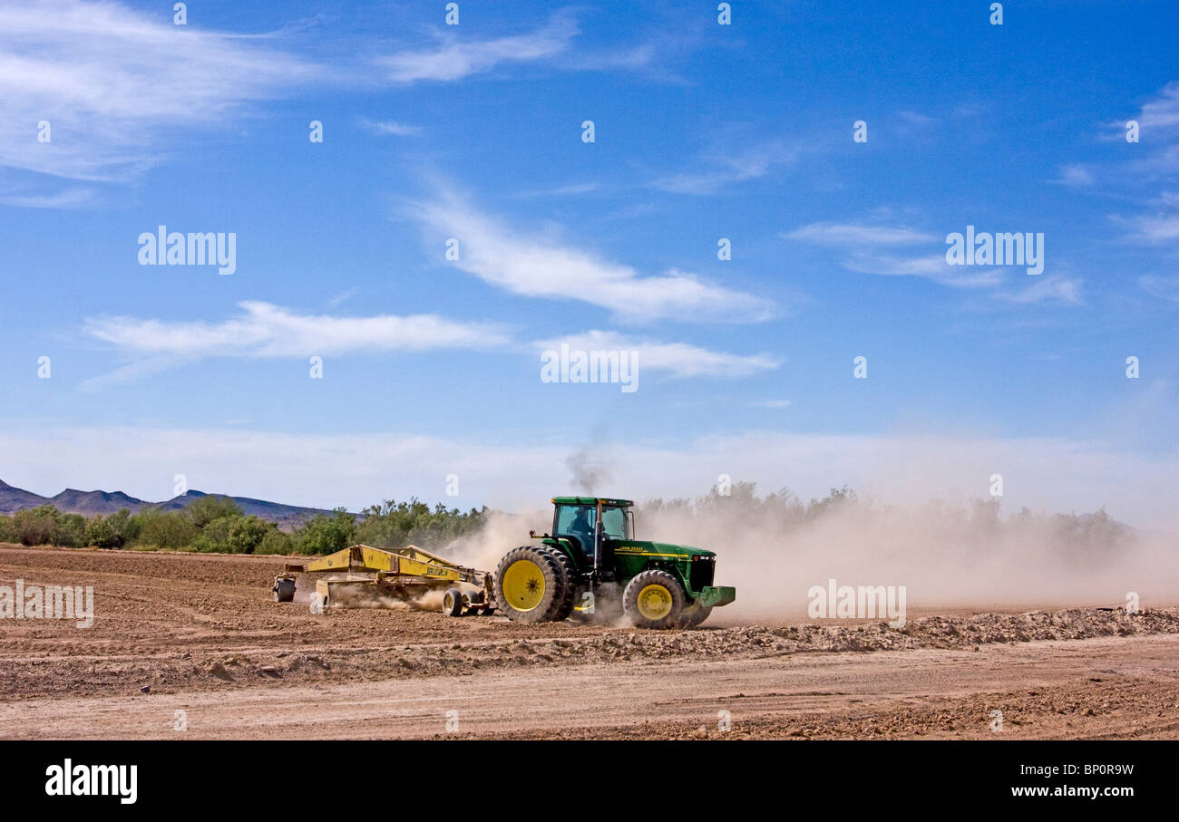 Land leveling implement is used to float level an agricultural field  in Arizona, USA Stock Photo
