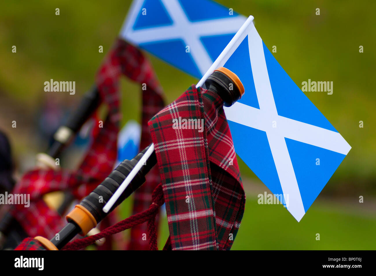 Scottish saltire on bagpipes in piping display near Arthurs Seat,  Edinburgh Stock Photo