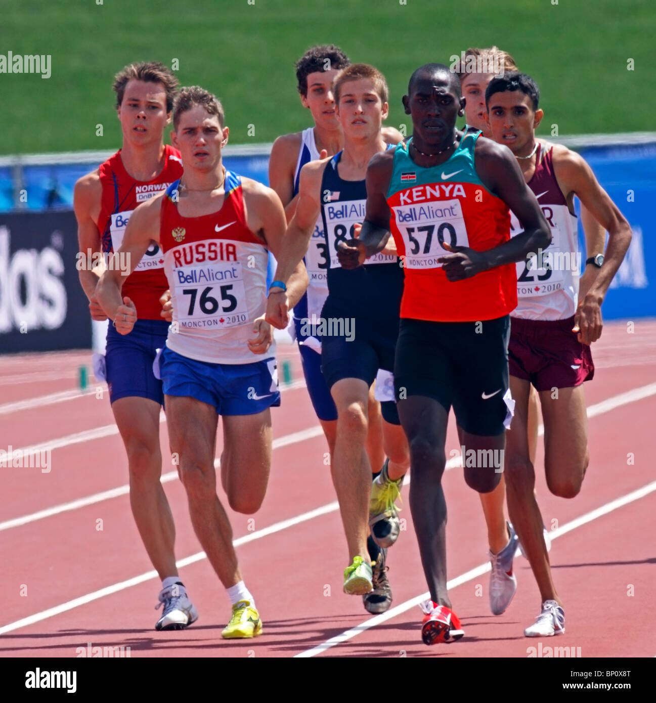David Mutinda Mutua (570) of Kenya leads the pack in the men's 800-metre semifinals at the 2010 IAAF World Junior Championships. Stock Photo