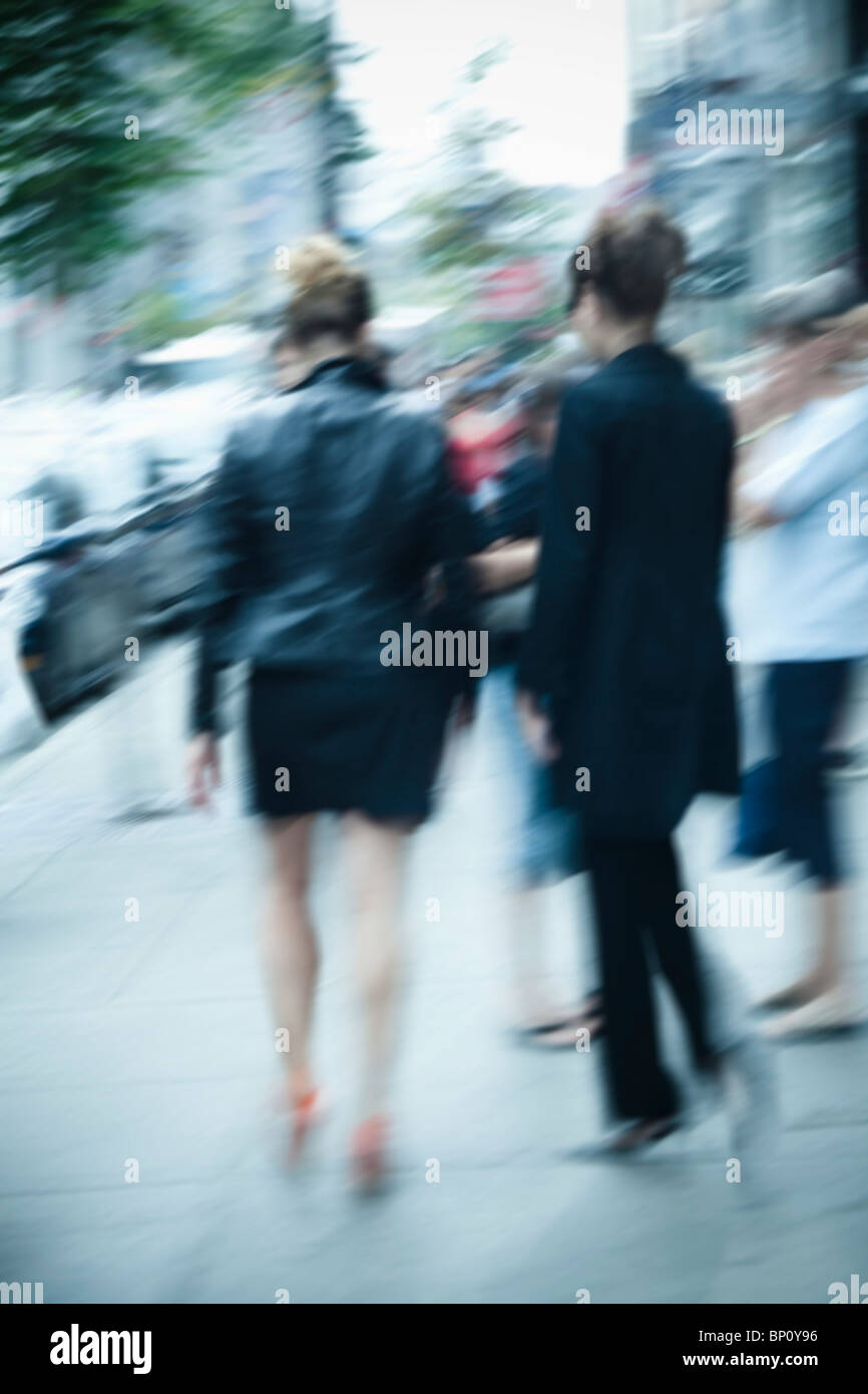Women walking street rear view hi-res stock photography and images - Alamy